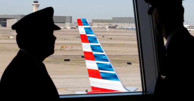 美国航空公司飞行员工会计划在机场进行纠察因为疲劳和过度安排的紧张局势升温